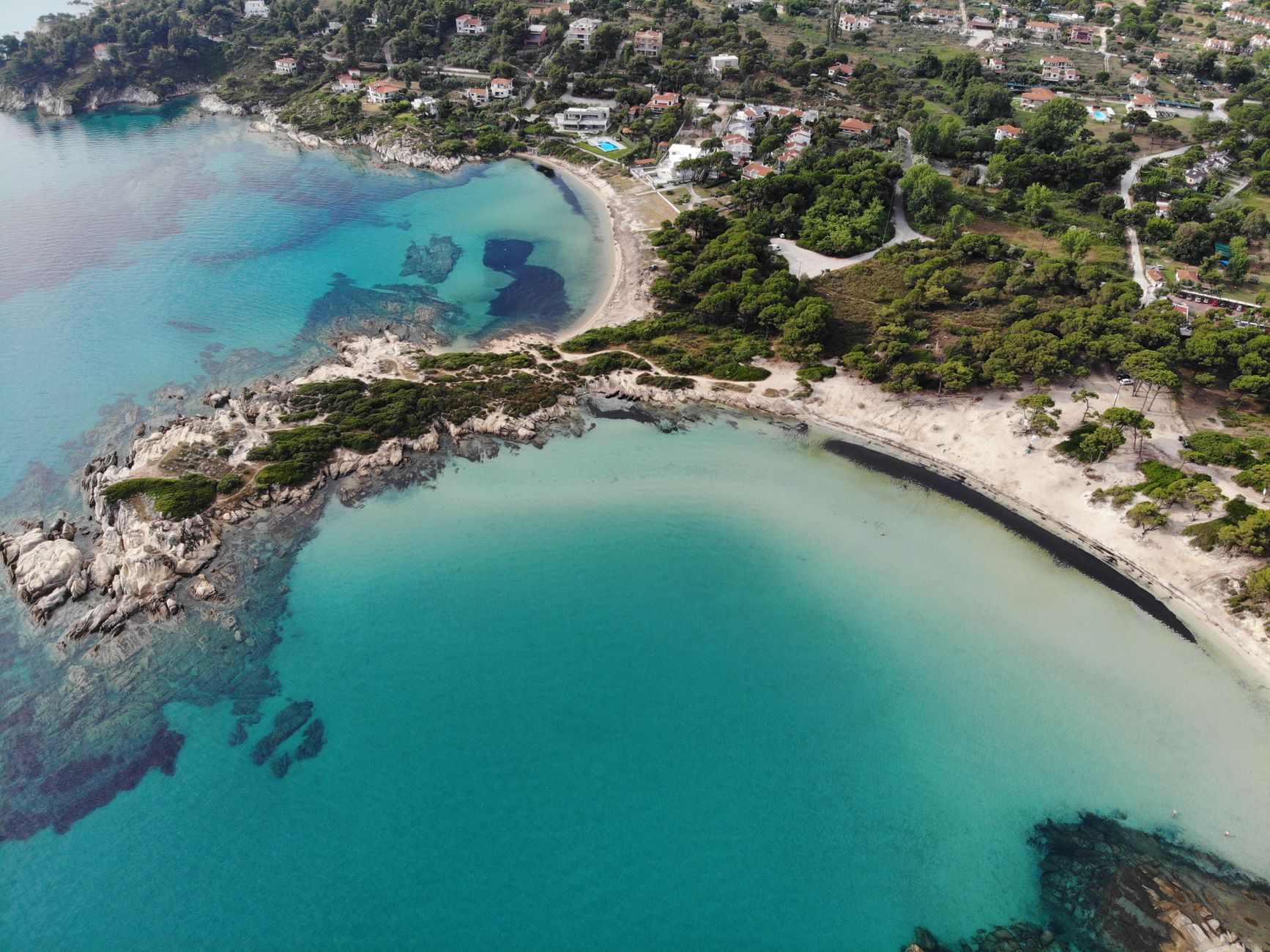 Aerial view of the turquoise coastline of Sithonia, Halkidiki, Greece